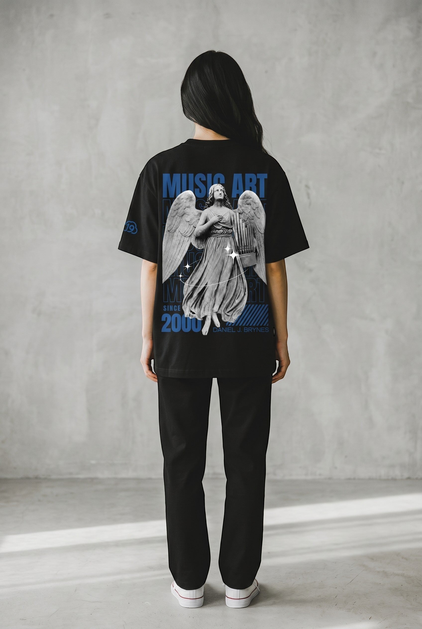 Cloud 19 Official Streetwear Malaysia black oversized 100% cotton t-shirt with angel graphic and blue text.